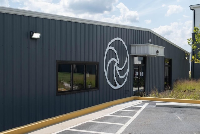 exterior space featuring uncovered parking
