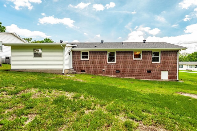 154 Church Ave, Watertown, TN 37184 - rear view of property featuring a yard, entry steps, brick siding, and crawl space