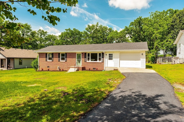 154 Church Ave, Watertown, TN 37184 - ranch-style house with driveway, brick siding, an attached garage, crawl space, and a front yard