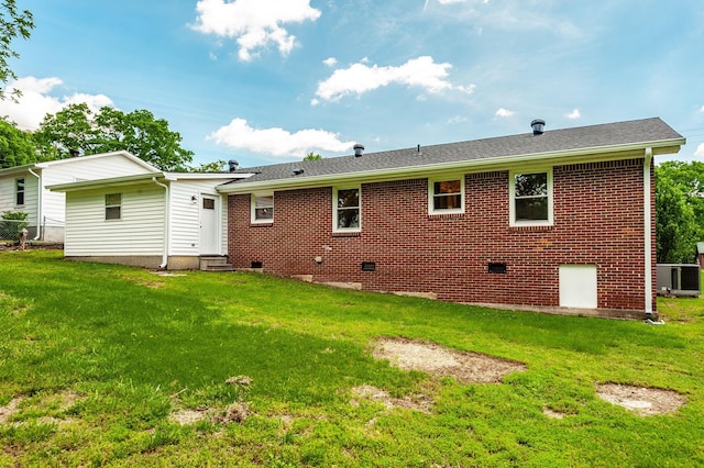 154 Church Ave, Watertown, TN 37184 - rear view of property with central AC, crawl space, a lawn, brick siding, and entry steps