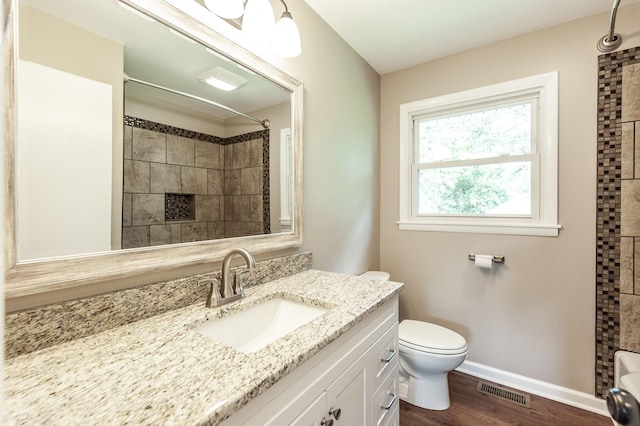 154 Church Ave, Watertown, TN 37184 - full bathroom featuring toilet, walk in shower, visible vents, vanity, and wood finished floors