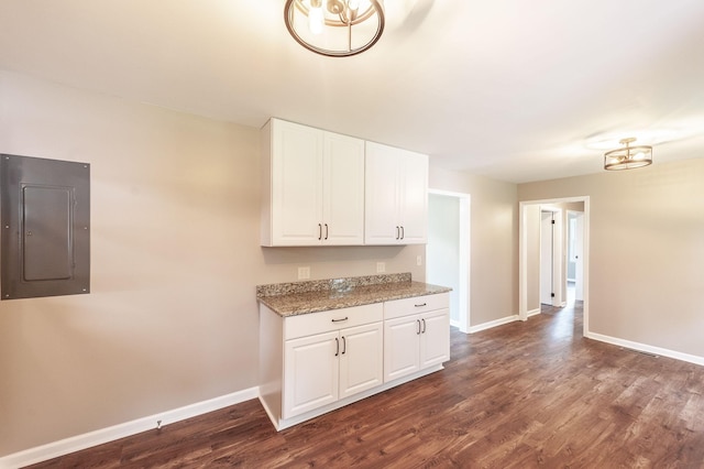 154 Church Ave, Watertown, TN 37184 - kitchen featuring baseboards, visible vents, white cabinetry, electric panel, and dark wood-style floors