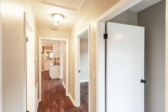 154 Church Ave, Watertown, TN 37184 - hallway with attic access, dark wood-type flooring, and baseboards