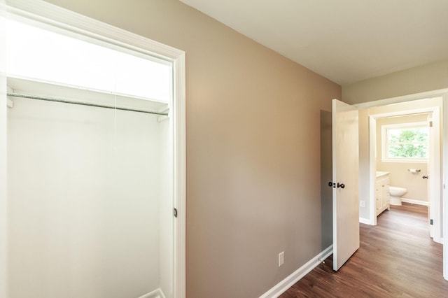 154 Church Ave, Watertown, TN 37184 - unfurnished bedroom featuring baseboards, a closet, and wood finished floors