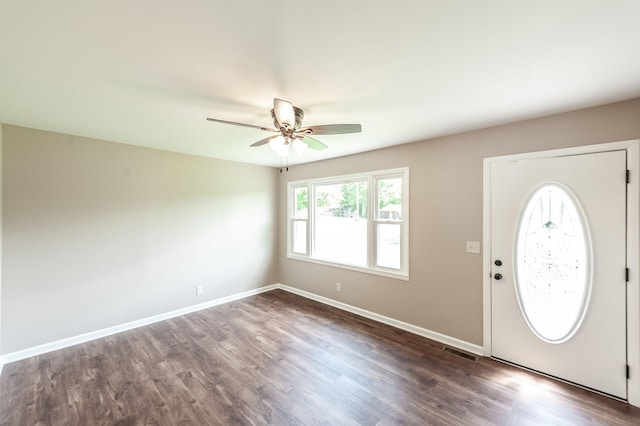 154 Church Ave, Watertown, TN 37184 - foyer entrance with baseboards, a ceiling fan, visible vents, and dark wood-type flooring