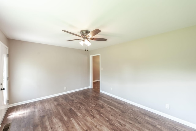 154 Church Ave, Watertown, TN 37184 - unfurnished room with visible vents, baseboards, ceiling fan, and dark wood-type flooring