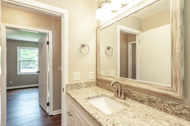 154 Church Ave, Watertown, TN 37184 - bathroom featuring baseboards, wood finished floors, and vanity