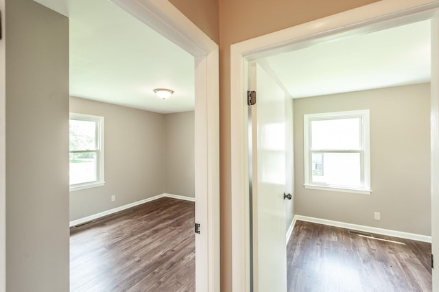 154 Church Ave, Watertown, TN 37184 - hallway with visible vents, wood finished floors, and baseboards
