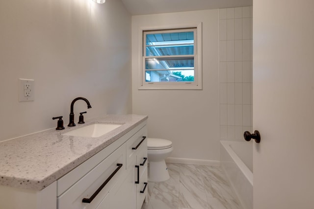 bathroom featuring vanity, baseboards, toilet, and marble finish floor