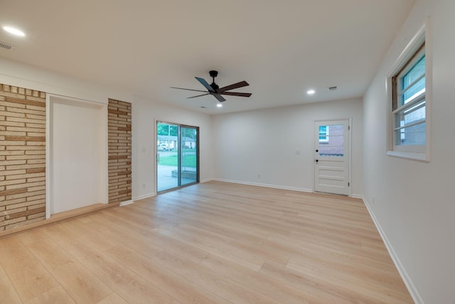 interior space featuring recessed lighting, ceiling fan, visible vents, and light wood-style floors