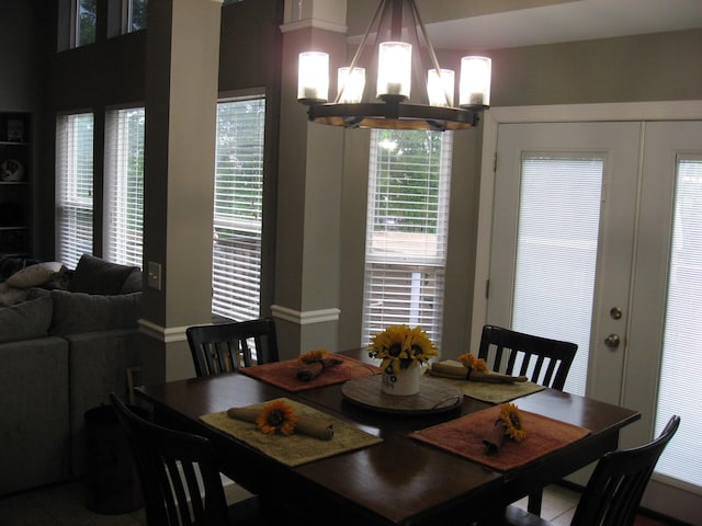 dining space with a chandelier and a wealth of natural light