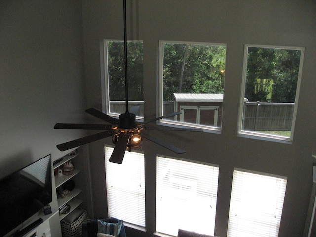interior details featuring ceiling fan