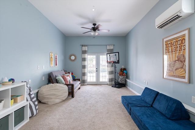 living room with light carpet, an AC wall unit, french doors, a ceiling fan, and baseboards