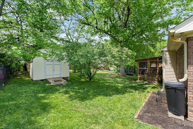 view of yard with a storage unit and an outdoor structure