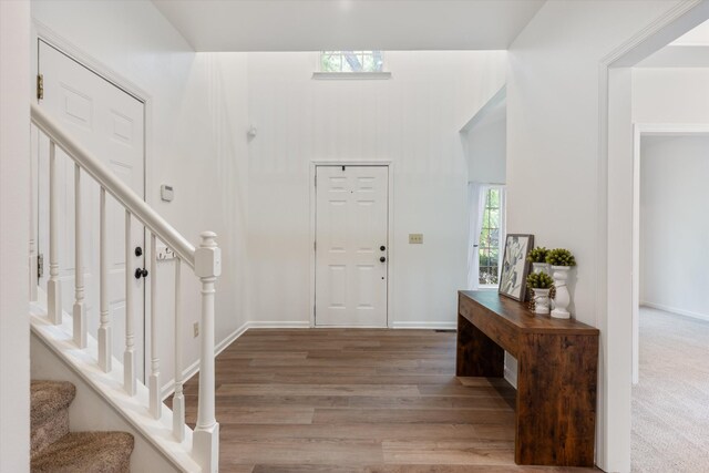 1069 Fitzpatrick Rd, Nashville, TN 37214 - foyer featuring stairway, wood finished floors, and baseboards
