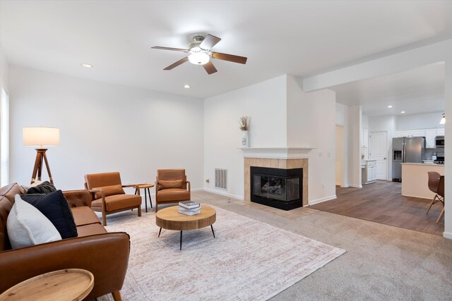 1069 Fitzpatrick Rd, Nashville, TN 37214 - carpeted living room with a ceiling fan, a fireplace, recessed lighting, and baseboards