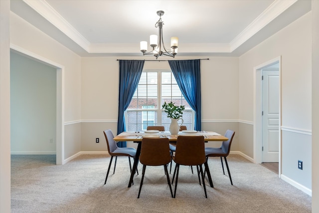 1069 Fitzpatrick Rd, Nashville, TN 37214 - carpeted dining area featuring a chandelier, a tray ceiling, crown molding, and baseboards