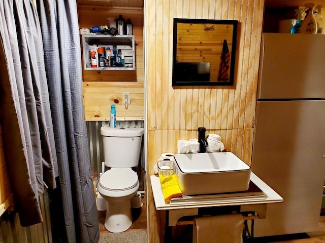 4179 Beaver Bend Dr, Nunnelly, TN 37137 - bathroom with toilet and wood walls