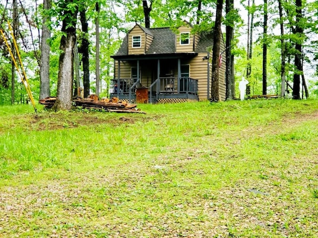 4179 Beaver Bend Dr, Nunnelly, TN 37137 - rear view of property with a porch and a shingled roof
