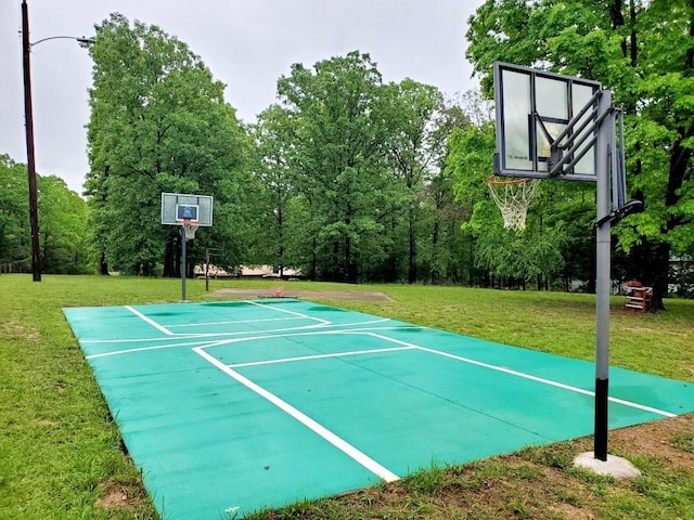 4179 Beaver Bend Dr, Nunnelly, TN 37137 - view of sport court featuring a lawn and basketball hoop