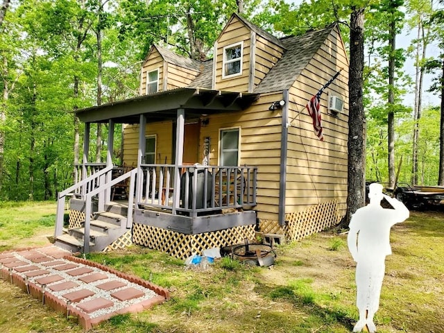 4179 Beaver Bend Dr, Nunnelly, TN 37137 - view of front of home featuring a porch and roof with shingles