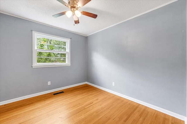 419 Westwood Dr, Tullahoma, TN 37388 - unfurnished room with light wood-style flooring, baseboards, a textured ceiling, ceiling fan, and crown molding