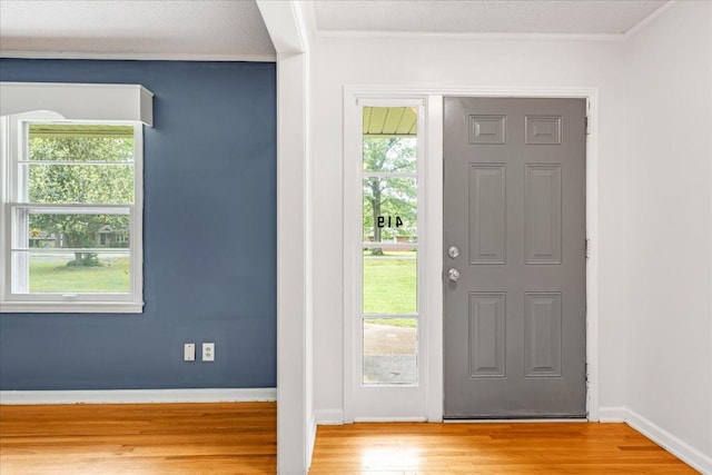 419 Westwood Dr, Tullahoma, TN 37388 - foyer entrance with wood finished floors, ornamental molding, and baseboards