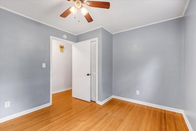 419 Westwood Dr, Tullahoma, TN 37388 - empty room with light wood-style floors, a ceiling fan, baseboards, crown molding, and a smoke detector