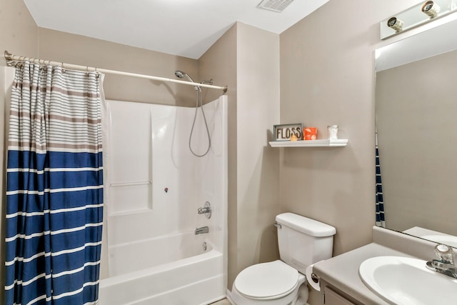 bathroom featuring toilet, visible vents, shower / bath combo, and vanity