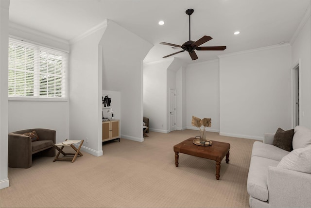 living area featuring a ceiling fan, recessed lighting, ornamental molding, and carpet