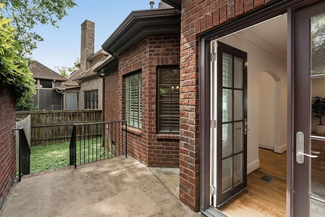 exterior space featuring fence and visible vents