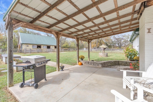 view of patio / terrace featuring a fenced backyard and a grill