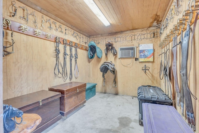view of stable with an AC wall unit