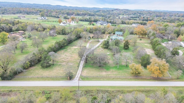 aerial view featuring a rural view and a mountain view