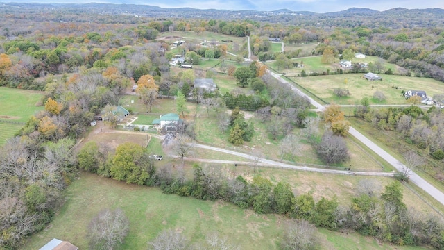 birds eye view of property with a rural view and a mountain view