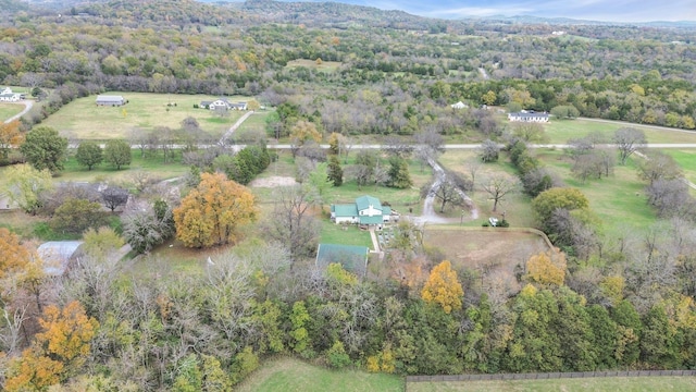 aerial view featuring a rural view and a view of trees