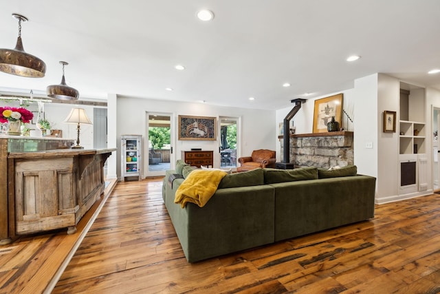 503 Brick Church Pike, Goodlettsville, TN 37072 - living room featuring a wood stove, recessed lighting, and hardwood / wood-style flooring