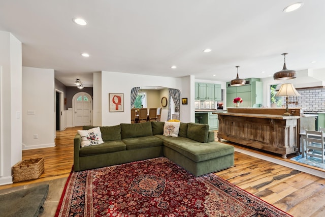 503 Brick Church Pike, Goodlettsville, TN 37072 - living room featuring light wood-style floors, baseboards, arched walkways, and recessed lighting