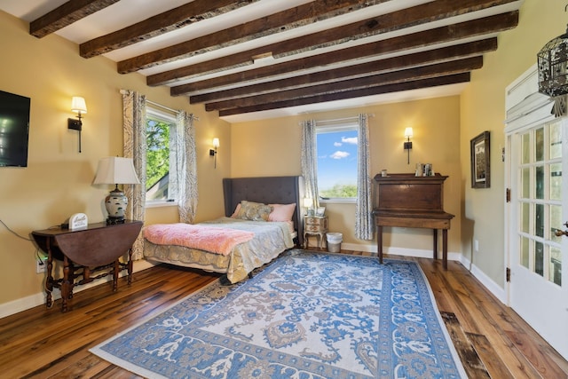503 Brick Church Pike, Goodlettsville, TN 37072 - bedroom featuring wood finished floors, multiple windows, and beam ceiling