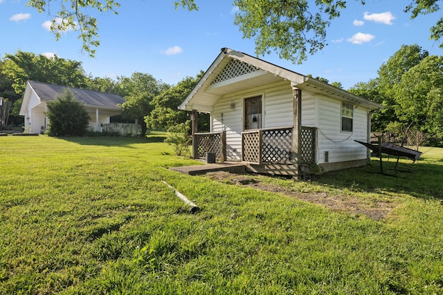 503 Brick Church Pike, Goodlettsville, TN 37072 - view of home's exterior featuring a wooden deck and a lawn