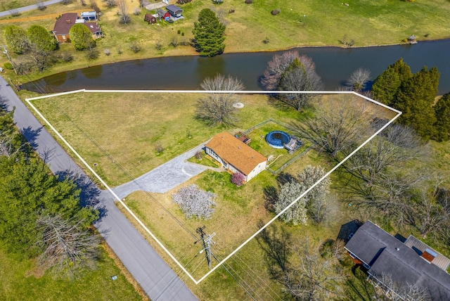 drone / aerial view featuring a water view