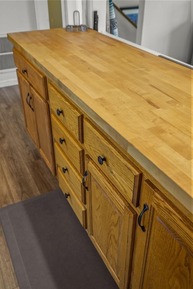 interior details featuring wood finished floors