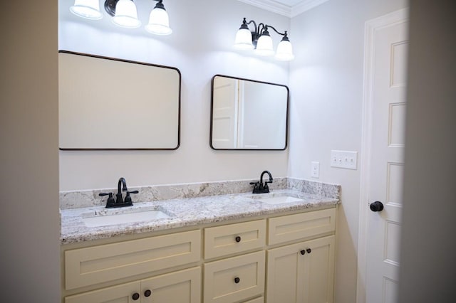 full bathroom featuring ornamental molding, double vanity, and a sink