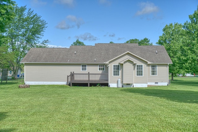 back of house with a lawn, a shingled roof, crawl space, and a wooden deck