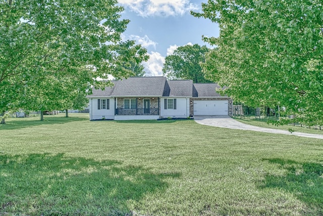 view of front facade featuring concrete driveway, a garage, and a front lawn
