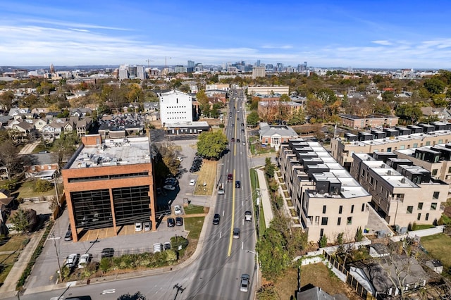 birds eye view of property with a view of city