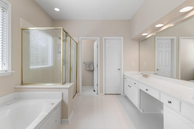 9404 Dove Field Ct, Brentwood, TN 37027 - full bath with a stall shower, tile patterned floors, a bath, vanity, and recessed lighting