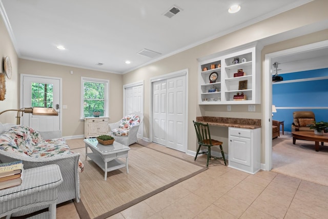 9404 Dove Field Ct, Brentwood, TN 37027 - living area with light tile patterned floors, built in desk, crown molding, and visible vents