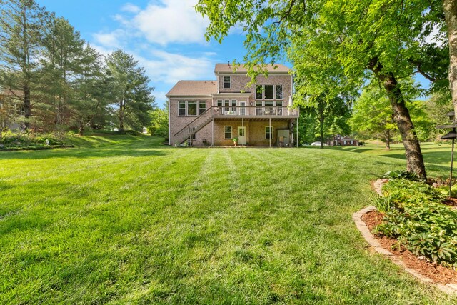 9404 Dove Field Ct, Brentwood, TN 37027 - back of property featuring a yard, a deck, stairs, and brick siding