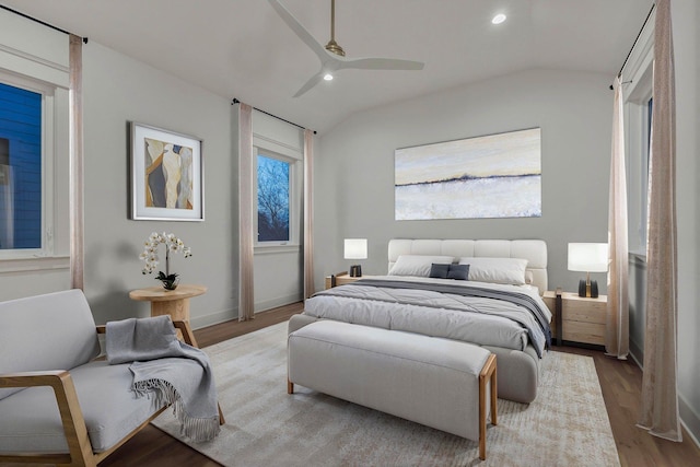 bedroom featuring lofted ceiling, recessed lighting, baseboards, ceiling fan, and wood finished floors